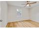 Empty bedroom with hardwood floors, natural light, and ceiling fan at 2311 Wintergreen Pl, Durham, NC 27707