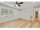 Clean, bright living room showcasing the hardwood floors and the natural light at 2311 Wintergreen Pl, Durham, NC 27707