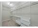 Walk-in closet with wire shelving and storage baskets, providing ample storage space in the home at 245 Kylemore Cir, Cary, NC 27513