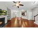 Expansive, open-concept living room with hardwood flooring and easy access to the kitchen and living spaces at 245 Kylemore Cir, Cary, NC 27513
