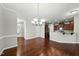 Dining area that flows into the kitchen, creating an ideal space for entertaining guests at 245 Kylemore Cir, Cary, NC 27513