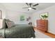 Comfortable bedroom with hardwood floors, natural light and stylish decor at 2508 Sevier St, Durham, NC 27705