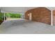 Large covered carport offers ample space at this brick house at 2508 Sevier St, Durham, NC 27705