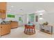 Bright kitchen with stainless steel sink, light wooden cabinets and eat-in dining area at 2508 Sevier St, Durham, NC 27705