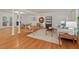 Spacious and open living area featuring hardwood floors, modern decor, and lots of natural light at 2508 Sevier St, Durham, NC 27705