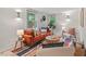 Inviting living room with cozy seating arrangement, contemporary decor, and lots of natural light at 2508 Sevier St, Durham, NC 27705