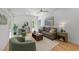 Bright living room with vaulted ceilings, lots of natural light and hardwood flooring at 2529 Remington Rd, Raleigh, NC 27610