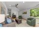 Open living room with vaulted ceilings, hardwood floors, and a comfortable seating area at 2529 Remington Rd, Raleigh, NC 27610