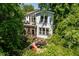 A stunning backyard featuring a dining area and a screened-in porch, perfect for outdoor relaxation at 2613 Bedford Ave, Raleigh, NC 27607