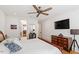 Comfortable bedroom with hardwood floors and television at 2613 Bedford Ave, Raleigh, NC 27607