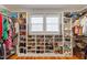 Walk-in closet with custom shelving and window at 2613 Bedford Ave, Raleigh, NC 27607