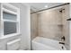 Bathroom showcasing tile surround and a tub at 2625 Stonington Dr, Cary, NC 27523
