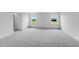 Spacious bedroom with plush carpeting, ample natural light from large windows, and neutral decor at 2625 Stonington Dr, Cary, NC 27523