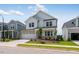 Charming two-story home featuring a brick and white facade, attached garage, and well-manicured lawn at 2625 Stonington Dr, Cary, NC 27523