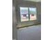 Bright bedroom featuring a large window, awaiting personal touches and decor at 2868 Quarry Rd # 167, Rolesville, NC 27571