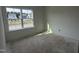 Bedroom featuring a large window providing views of the neighborhood at 2868 Quarry Rd # 167, Rolesville, NC 27571