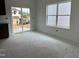 Bright dining area with large windows and sliding glass doors leading to the backyard at 2868 Quarry Rd # 167, Rolesville, NC 27571
