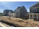 View of new homes in a neighborhood, showcasing consistent design and landscaping at 2868 Quarry Rd # 167, Rolesville, NC 27571