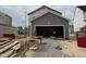 An unfinished garage showcasing the framing and gravel flooring at 2868 Quarry Rd # 167, Rolesville, NC 27571