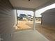 View of the backyard through a covered patio at 2868 Quarry Rd # 167, Rolesville, NC 27571
