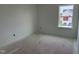 Bright bedroom with a large window offers a view of the neighborhood at 2872 Quarry Rd # 166, Rolesville, NC 27571