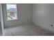 Bedroom with a bright window offering natural light and neighborhood views at 2872 Quarry Rd # 166, Rolesville, NC 27571