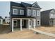 Exterior of a newly built gray home with white trim at 2872 Quarry Rd # 166, Rolesville, NC 27571