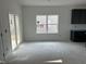 Bright new kitchen area with sliding glass doors and window, awaiting finishing touches at 2872 Quarry Rd # 166, Rolesville, NC 27571