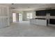 Spacious kitchen with open layout, base cabinetry, and natural light at 2872 Quarry Rd # 166, Rolesville, NC 27571