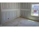 Unfinished bedroom with natural light from a window, ready for customization at 2872 Quarry Rd # 166, Rolesville, NC 27571