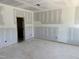 Unfinished room ready for customization with natural wood trim at 2872 Quarry Rd # 166, Rolesville, NC 27571