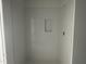 Modern shower featuring sleek white tile and a convenient recessed shelf at 2872 Quarry Rd # 166, Rolesville, NC 27571