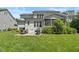 Well-maintained backyard with patio, grill, and lush green lawn at 2993 Club Dr, Raleigh, NC 27613