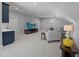 Open floorplan bonus room with wet bar, tv, neutral walls and plush carpet at 2993 Club Dr, Raleigh, NC 27613