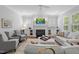 Comfortable living room with fireplace, built-in shelving, and soft, neutral tones at 2993 Club Dr, Raleigh, NC 27613