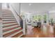 Bright living room with hardwood floors, comfortable seating, and a cozy atmosphere at 2993 Club Dr, Raleigh, NC 27613