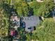 Aerial view of roof with skylights and surrounding foliage at 300 S Pine St, Benson, NC 27504