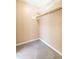 Empty closet features neutral paint and shelving at 3029 Wycliff Rd, Raleigh, NC 27607
