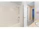 A clean, bright shower featuring a shower head and simple temperature control hardware at 3029 Wycliff Rd, Raleigh, NC 27607