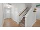 Welcoming entryway featuring a staircase, wood floors, and ample natural light at 303 Forestview Crest Way, Fuquay Varina, NC 27526