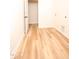 Functional laundry room featuring neutral walls, flooring, and washer/dryer hookups at 305 W Waddell St, Selma, NC 27576