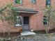 Charming entryway with a brick facade and cozy welcome mat at 307 Clayton Rd, Chapel Hill, NC 27514
