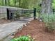 Secured by an iron gate, the property offers privacy at 307 Clayton Rd, Chapel Hill, NC 27514