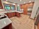 Well-appointed kitchen with custom cabinets, stainless steel appliances, and a marble countertop island at 307 Clayton Rd, Chapel Hill, NC 27514