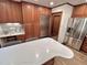 Bright, updated kitchen features stainless steel appliances, a white countertop island, and custom cabinets at 307 Clayton Rd, Chapel Hill, NC 27514