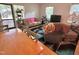 Bright living room with large windows and hardwood floors at 307 Clayton Rd, Chapel Hill, NC 27514