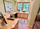 Bright office featuring a large window with nature view and built-in desk at 307 Clayton Rd, Chapel Hill, NC 27514