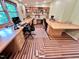 Bright home office features custom built-ins, a unique floor pattern, and views of the beautiful outdoors at 307 Clayton Rd, Chapel Hill, NC 27514