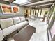 Relaxing sun room showcasing a comfortable seating area and an adjacent dining space at 307 Clayton Rd, Chapel Hill, NC 27514