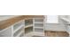 Corner nook showcasing white built-in shelves with a wood countertop at 324 Prides Xing, Rolesville, NC 27571